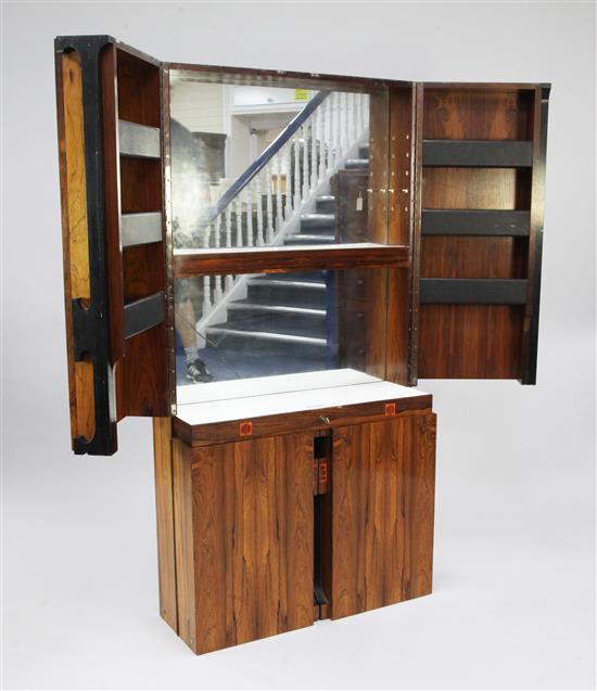 A 1960 / 70s Continental rosewood hanging drinks cabinet, H.4ft 10.5in. D.10.5in.